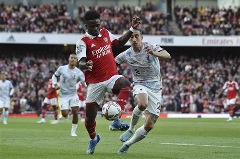 Saka's penalty keeps Arsenal top in 3-2 win over Liverpool | AP News