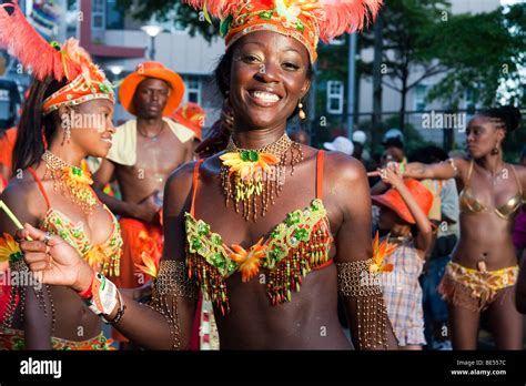 People dancing, dressed up for Carnival in Trinidad Tobago Stock Photo - Alamy