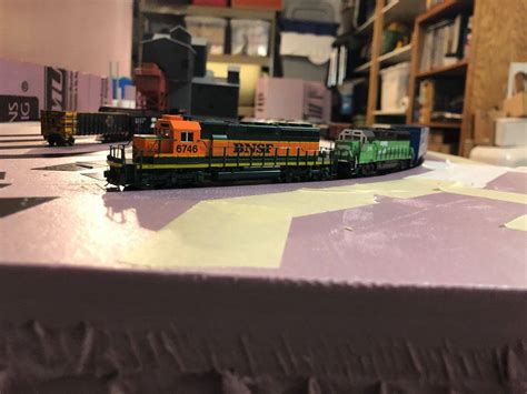 Here are some more newer photos. My BNSF SD40-2 locomotive followed by a BN GP60 locomotive. An ...