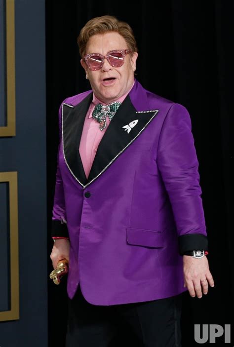 Photo: Elton John wins an Oscar at the 92nd annual Academy Awards in Los Angeles ...