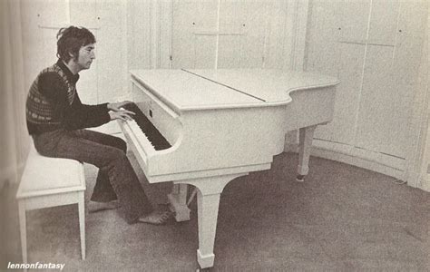 John at the famous white piano at their home in Tittenhurst Park, this is the piano he wrote ...