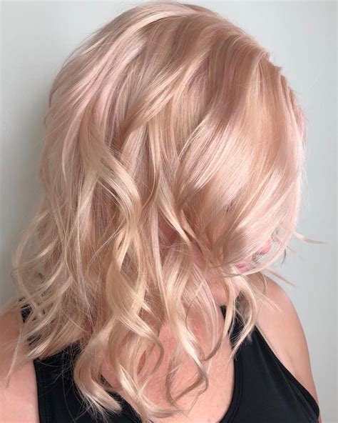 Champagne rose pink blonde hair color by Aveda Artist Haley Pirkle. | Pink blonde hair, Gold ...