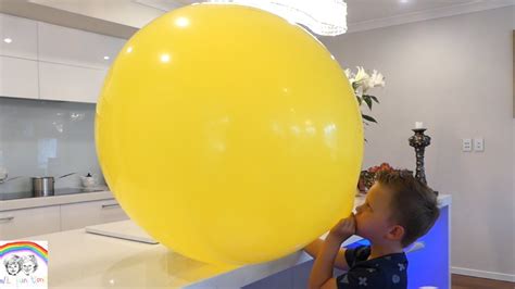 KIDS CHALLENGE TRYING BLOW TO POP MASSIVE BALLOON!!! CAN WE POP IT??? - YouTube