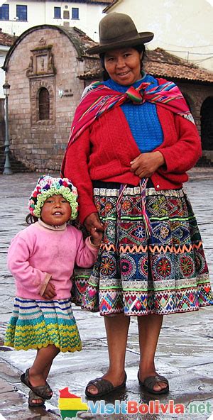 Bolivians in their traditional dresses | Bolivian clothing, Traditional outfits, Traditional dresses