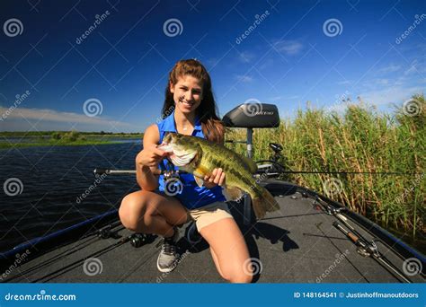 Woman Holding Large Mouth Bass Caught Fishing from Boat Editorial Photo ...