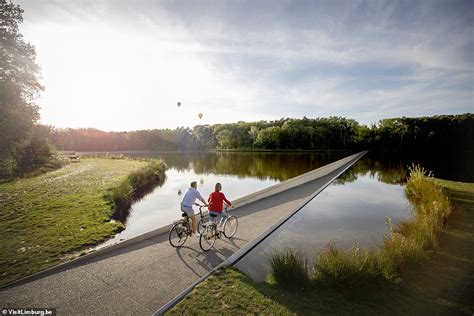 The stunning bike path in Belgium that leaves cyclists feeling like they're riding through water ...