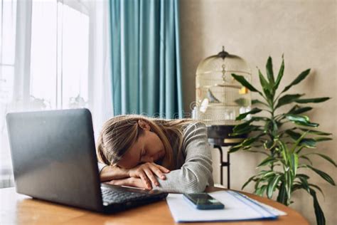 The Girl Fell Asleep at the Table in Front of the Computer from Hard Work. Stock Image - Image ...