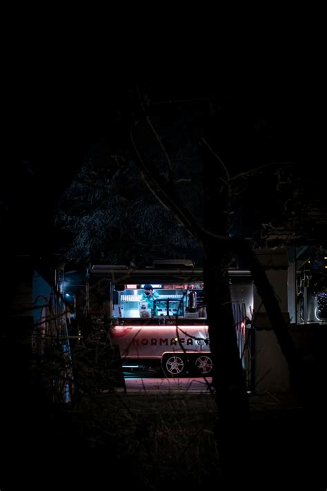 Red bus on road during night time photo – Free Budapest Image on Unsplash