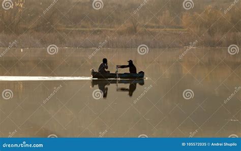 Fishing Boat on the Lake at Sunset Stock Image - Image of beauty, boat: 105572035