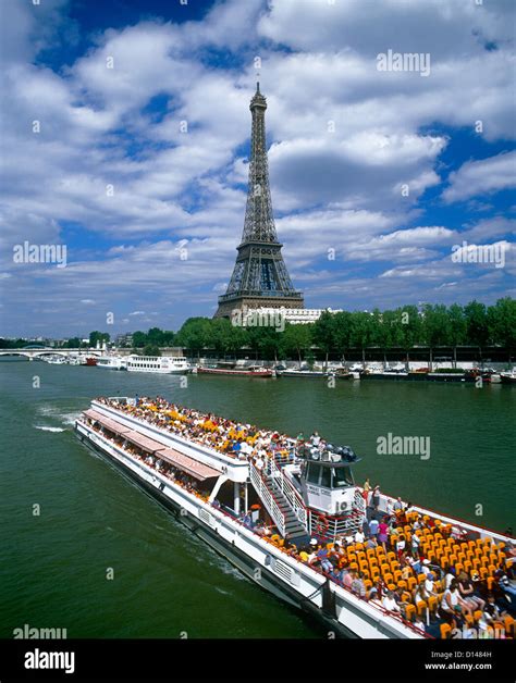 Eiffel Tower and Bateau Mouche on the River Seine, Paris, France Stock ...