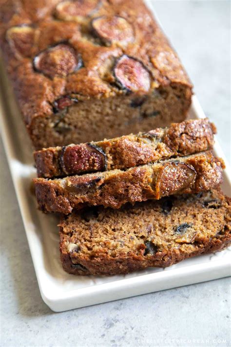 Brown sugar banana bread mixed with chopped figs in the batter and sliced figs on top to garnish ...