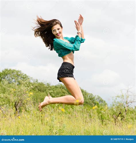 Beautiful Young Happy Woman Dancing & Jumping Outdoors On Summer Day Stock Image - Image: 34879719