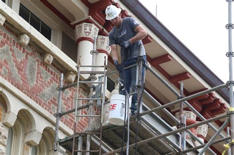 ‘Dyche Hall felt incomplete’: After 5-year absence, stone grotesques being reinstalled on KU ...