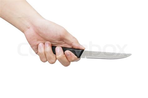 Isolated hand holding knife in white ... | Stock image | Colourbox