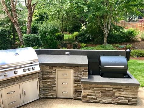 Traeger smoker outdoor kitchen by Sunset Outdoor Living, LLC. | Outdoor bbq kitchen, Outdoor ...