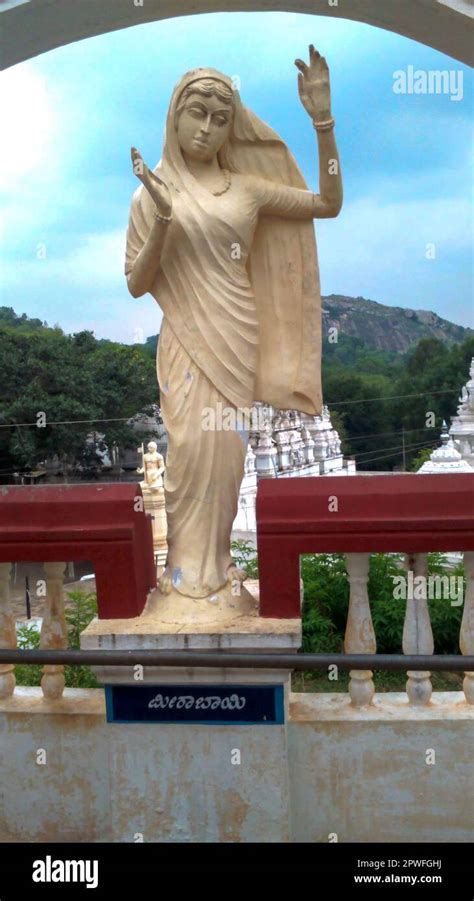 Statue of Mirabai. She was a 16th-century Hindu mystic poet and devotee of Krishna. Kannada text ...