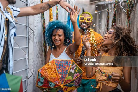 Group Of Young People Dancing Brazilian Carnival Stock Photo - Download Image Now - Carnival ...