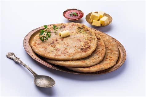 Aloo Gobi Paratha 16585819 Stock Photo at Vecteezy