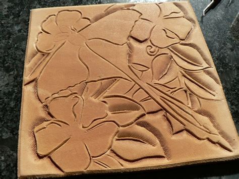 Tooled leather wall art | Leather wall, Leather tooling, Leather art