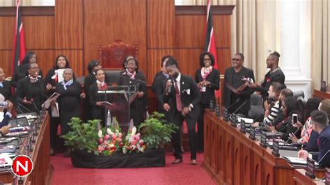 Members of the Trinidad and Tobago Parliament Choir sing Black Stalin's We Can Make It during ...