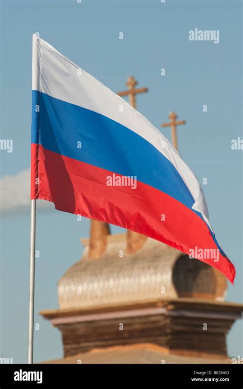 Russian flag on the Russian orthodox wooden church background Stock ...