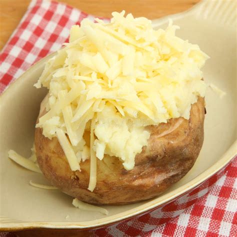 Baked or Jacket Potato with Cheese Stock Image - Image of cheddar, vegetable: 33622561