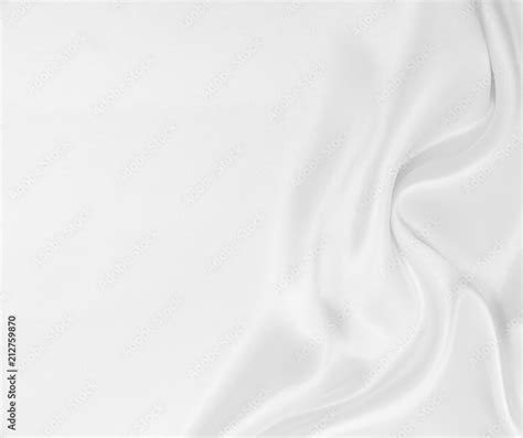 Smooth elegant white silk or satin luxury cloth texture as wedding background. Luxurious ...