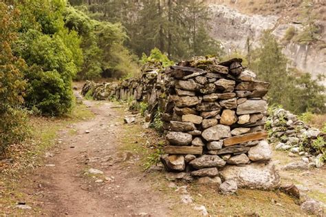 Premium Photo | Prayer stone wall on the road in the himalayas