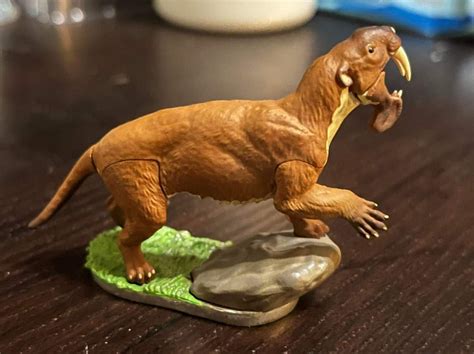 Thylacosmilus prehistoric mammal dinosaur PVC mini figure model capsule. Size: around 7cm in ...