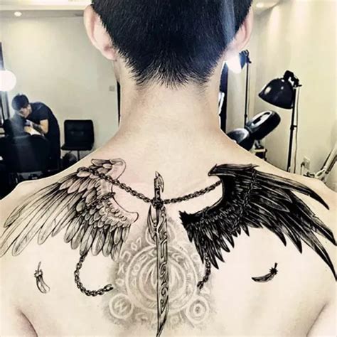 Aggregate 71+ angel wings chest tattoo super hot - vova.edu.vn