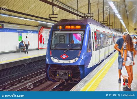 Metro Train in the Subway of the Madrid Metro with People on Sta ...