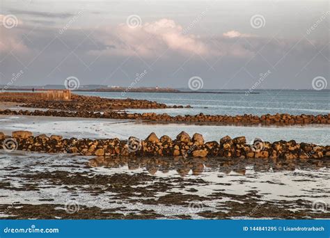 Sunset at Salthill Beach in Galway Bay Stock Image - Image of rock, beach: 144841295