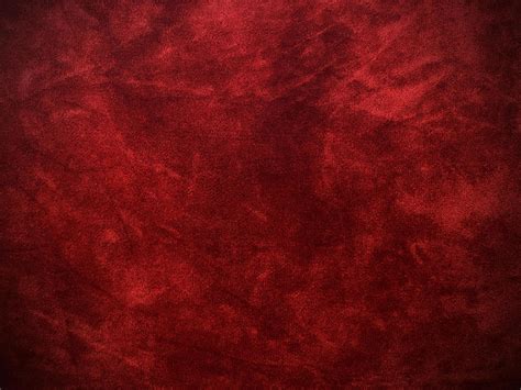 Dark red velvet fabric texture used as background. Empty dark red fabric background of soft and ...