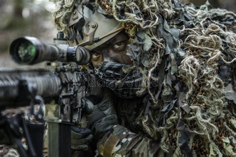 Sniper Wearing Ghillie Suit Stock Photo - Image of firearms, nato: 79932160