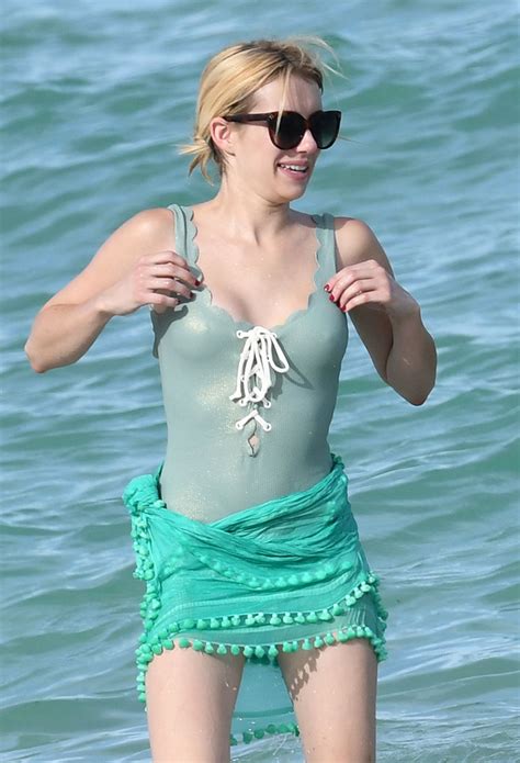 Emma Roberts in a Swimsuit on the Beach in Miami, July 2016 • CelebMafia