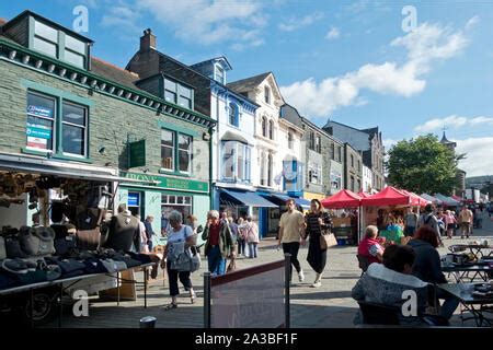 Keswick Market in the Lake District Cumbria UK with market stalls on an overcast day in winter ...