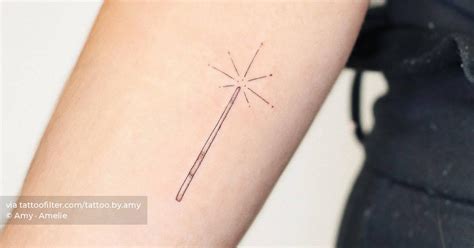 Fine line magic wand tattoo located on the inner