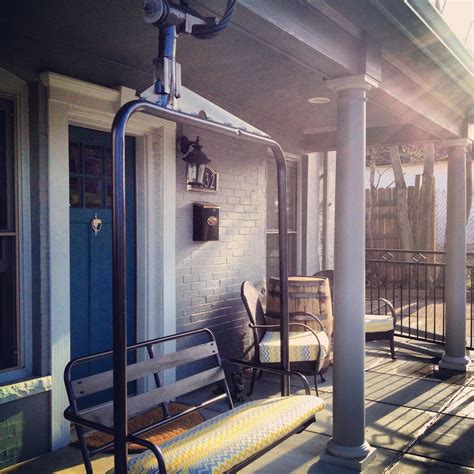 Ski lift chair repurposed as a front porch swing at the chalet Veranda ...