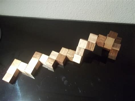 Casse-tête : le snake cube 3x3x3 en bois et sa solution – Le blog de ...