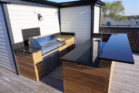 Rooftop Deck And Green Space - Denver - Roof Decks, Pergolas, and Outdoor Living Spaces