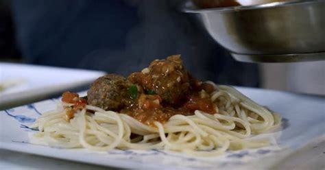 Adding sauce to meatballs plating vegan meatballs Preparing ingredients ...