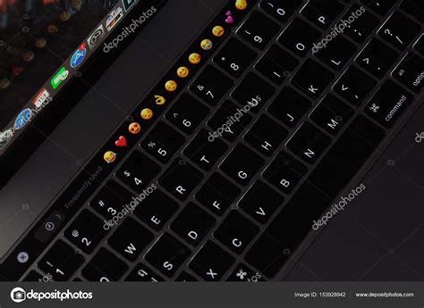 Closeup new macbook pro 2016 keyboard showing illuminated and emoji on touch bar – Stock ...