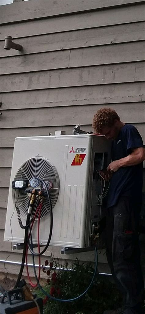 Compass Installation Technician, Kyle, installing a Mitsubishi Hyper Heat H2i single zone heat ...