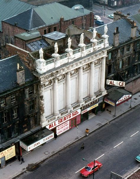 Citizens Theatre statues returned to rooftop - BBC News