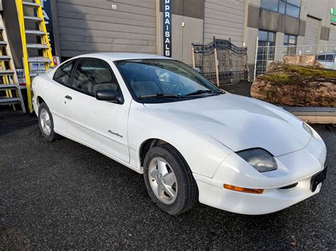 1999 PONTIAC SUNFIRE, WHITE, 2DRCP, GAS, AUTOMATIC, VIN ...