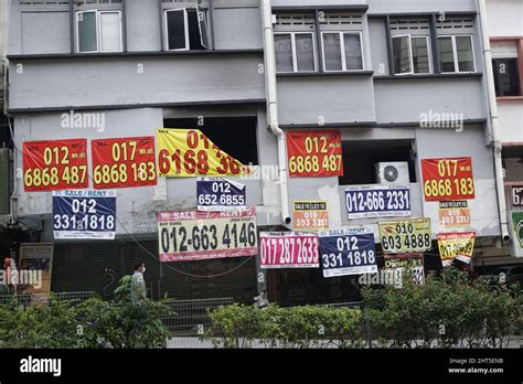 real estate negotiator banner property for sale or rent in Malaysia Stock Photo - Alamy