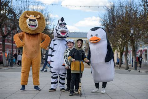 Animators in Costumes from the Cartoon Madagascar are Photographed with ...