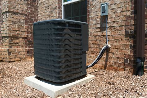 An hvac system outside a home.