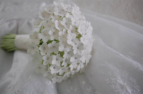 Stephanotis wedding bouquet for a bride in UK | Handmade PaPer FloweRs by Maria Noble