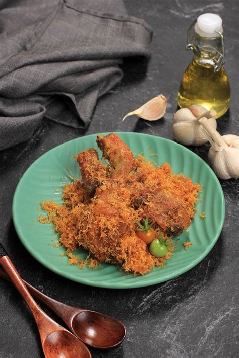 Ayam Serundeng, Indonesian Traditional Fried Chicken Recipe with Shredded Coconut Stock Photo ...